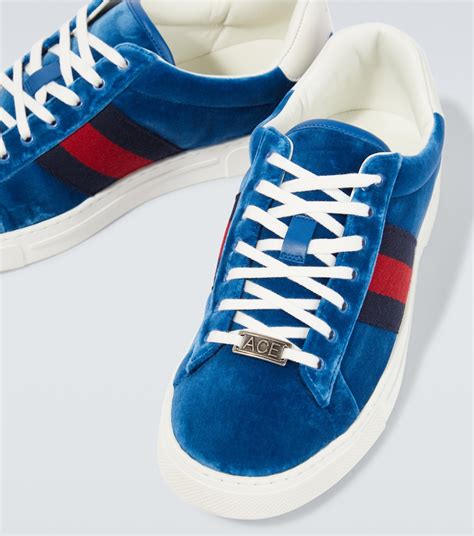 red and blue Gucci shoes